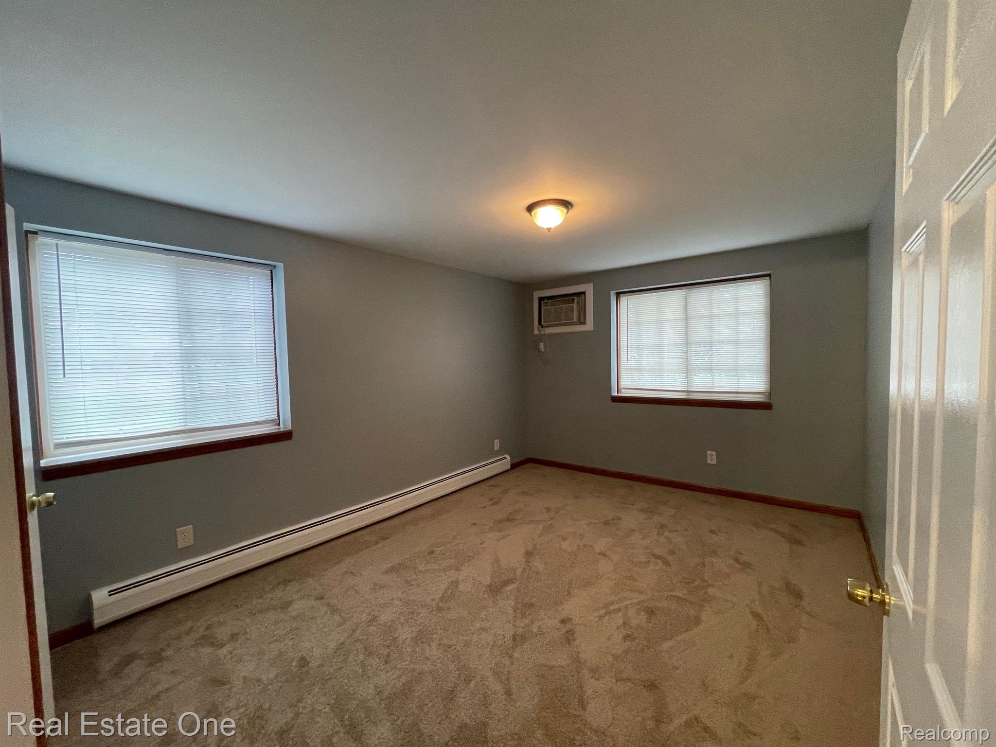 475 Baldwin Avenue, Unit 110 Rochester, MI 48307 - Photo 16 of 22 Primary Bedroom