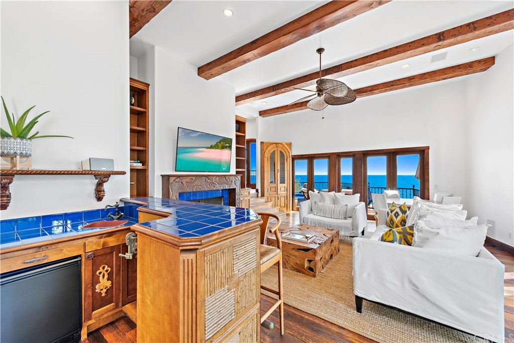 111 Emerald Bay Laguna Beach, CA 92651 - Photo 14 of 60 a living room with furniture and a window