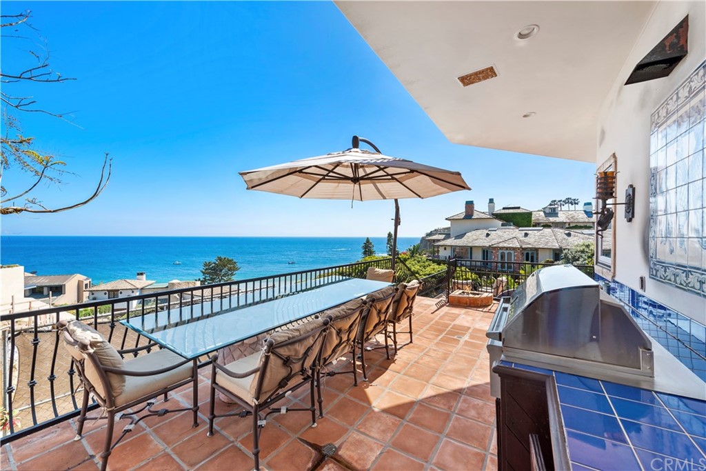 111 Emerald Bay Laguna Beach, CA 92651 - Photo 21 of 60 a view of a swimming pool with chairs