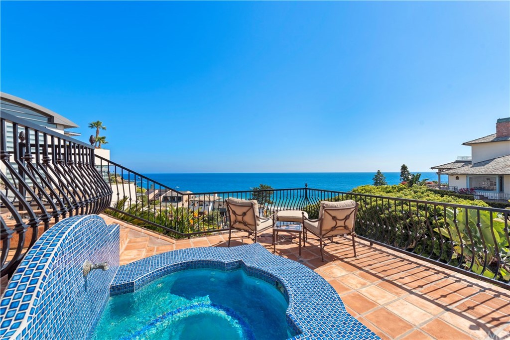 111 Emerald Bay Laguna Beach, CA 92651 - Photo 27 of 60 a balcony with chairs