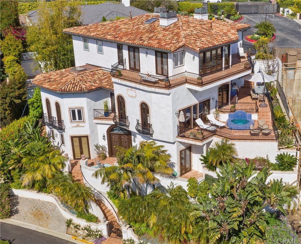 111 Emerald Bay Laguna Beach, CA 92651 - Photo 53 of 60 a aerial view of a house with swimming pool