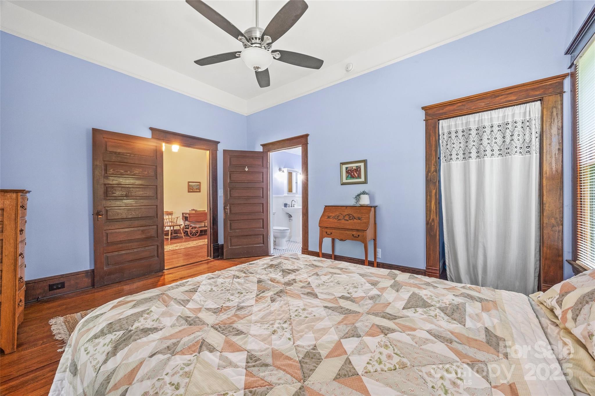 4569 Edgeland Road Edgemoor, SC 29712 - Photo 24 of 44 a bedroom with a bed dresser and a flat tv screen