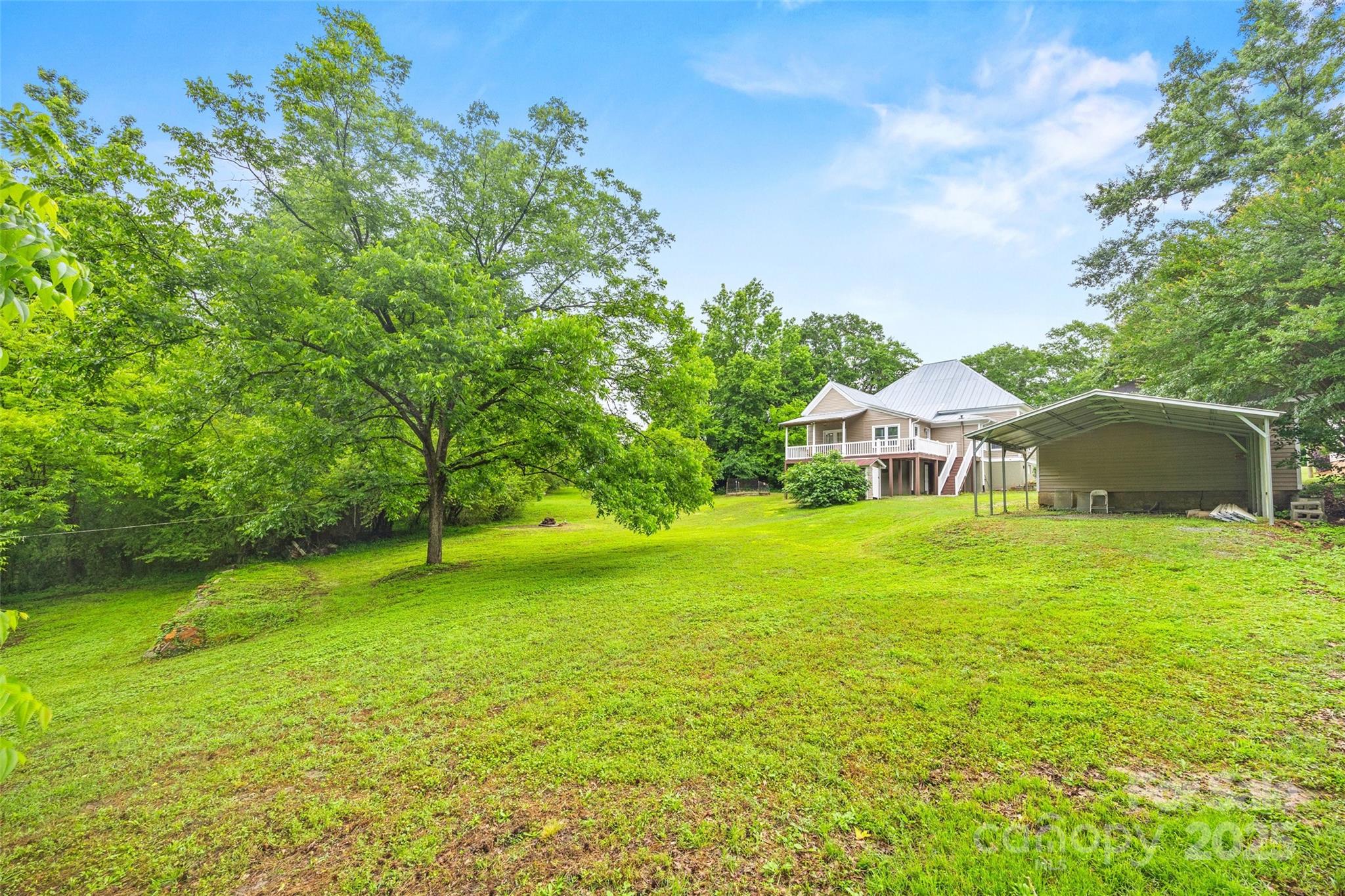 4569 Edgeland Road Edgemoor, SC 29712 - Photo 39 of 44 a front view of a house with a garden