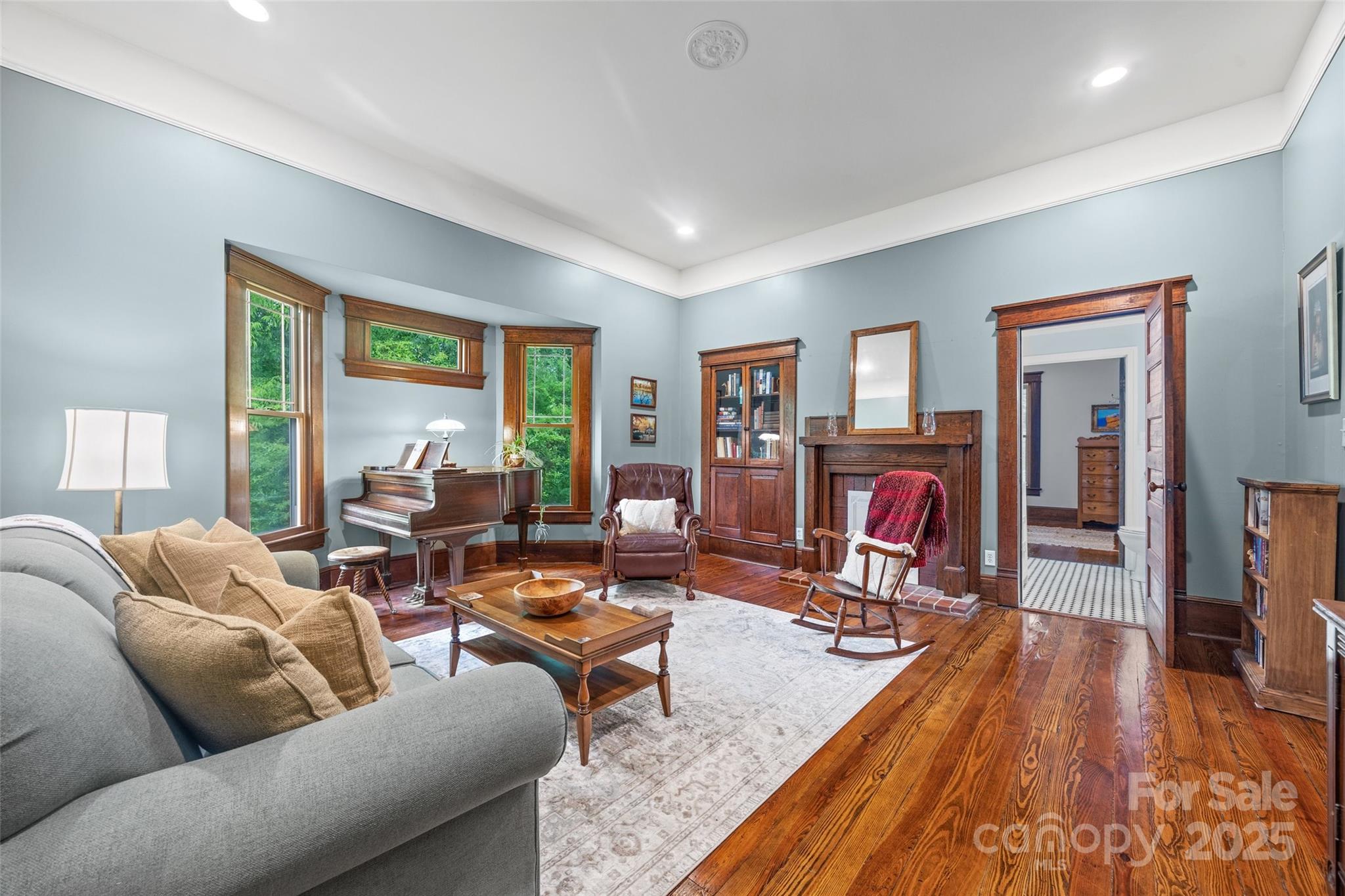 4569 Edgeland Road Edgemoor, SC 29712 - Photo 6 of 44 a living room with furniture and a fireplace