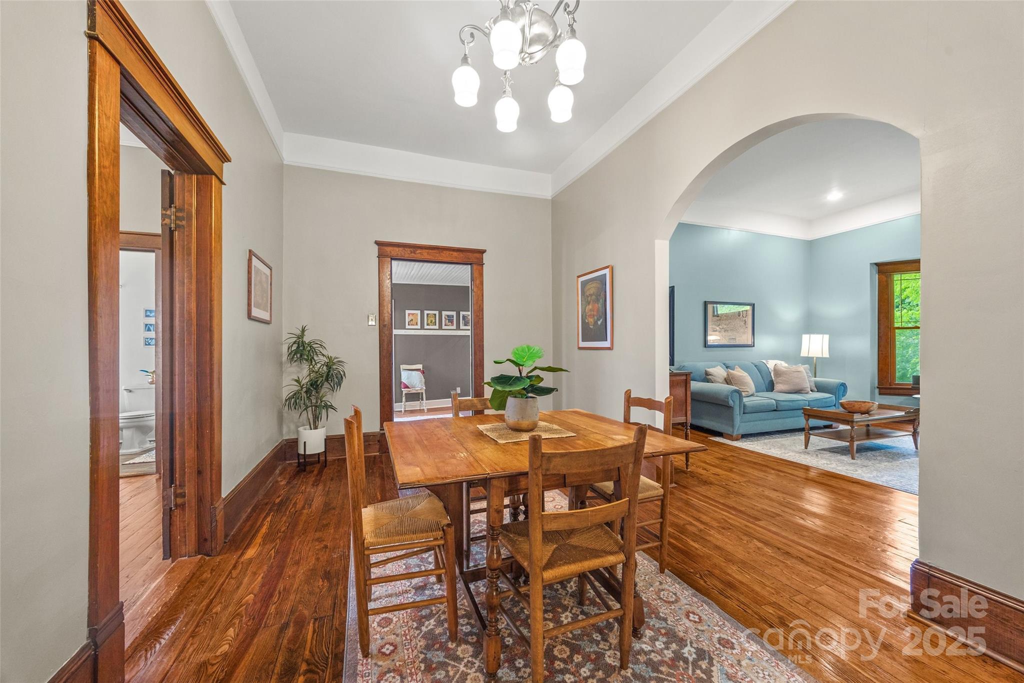 4569 Edgeland Road Edgemoor, SC 29712 - Photo 9 of 44 a view of a dining room with furniture window and wooden floor