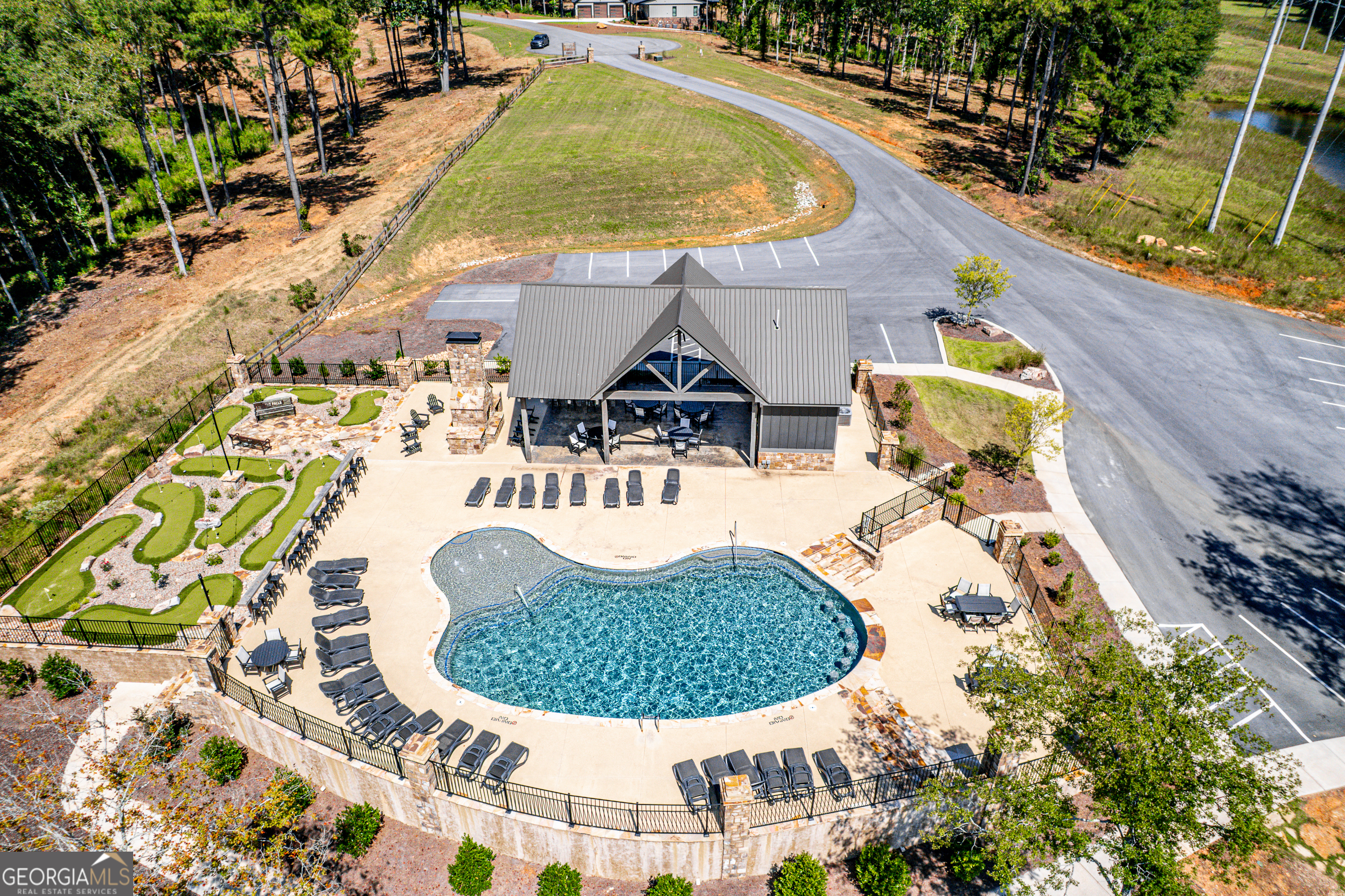 302 Wind Rock Ridge Northeast Milledgeville, GA 31061 - Photo 15 of 24 swimming pool view with a outdoor seating space