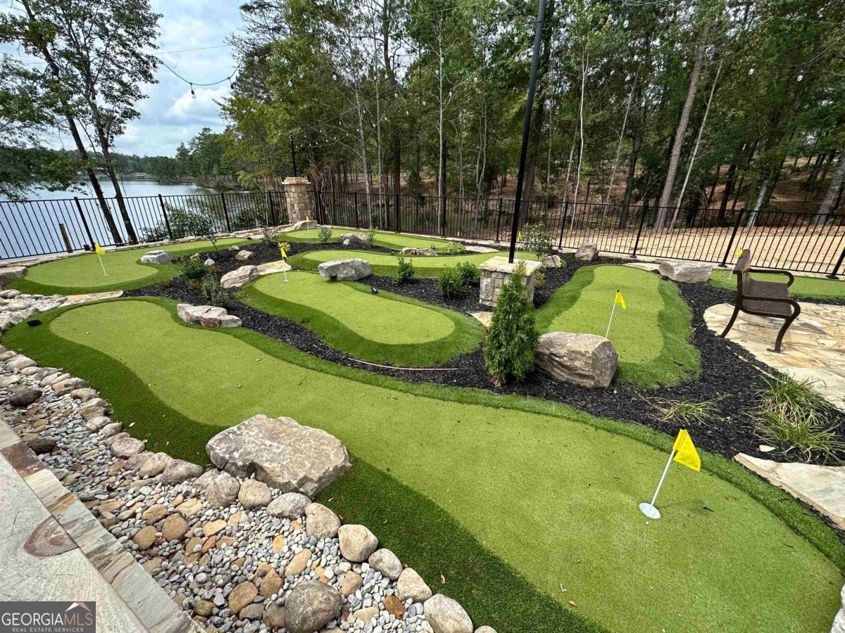 302 Wind Rock Ridge Northeast Milledgeville, GA 31061 - Photo 6 of 24 a view of swimming pool with a patio