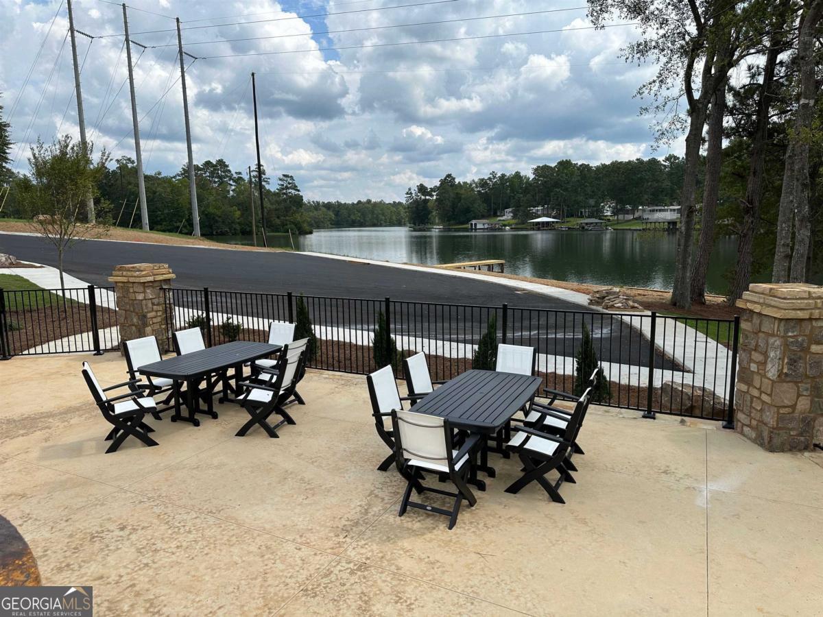 302 Wind Rock Ridge Northeast Milledgeville, GA 31061 - Photo 8 of 11 a view of a terrace with sitting area