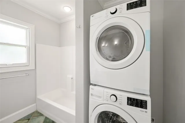 a utility room with dryer and washer