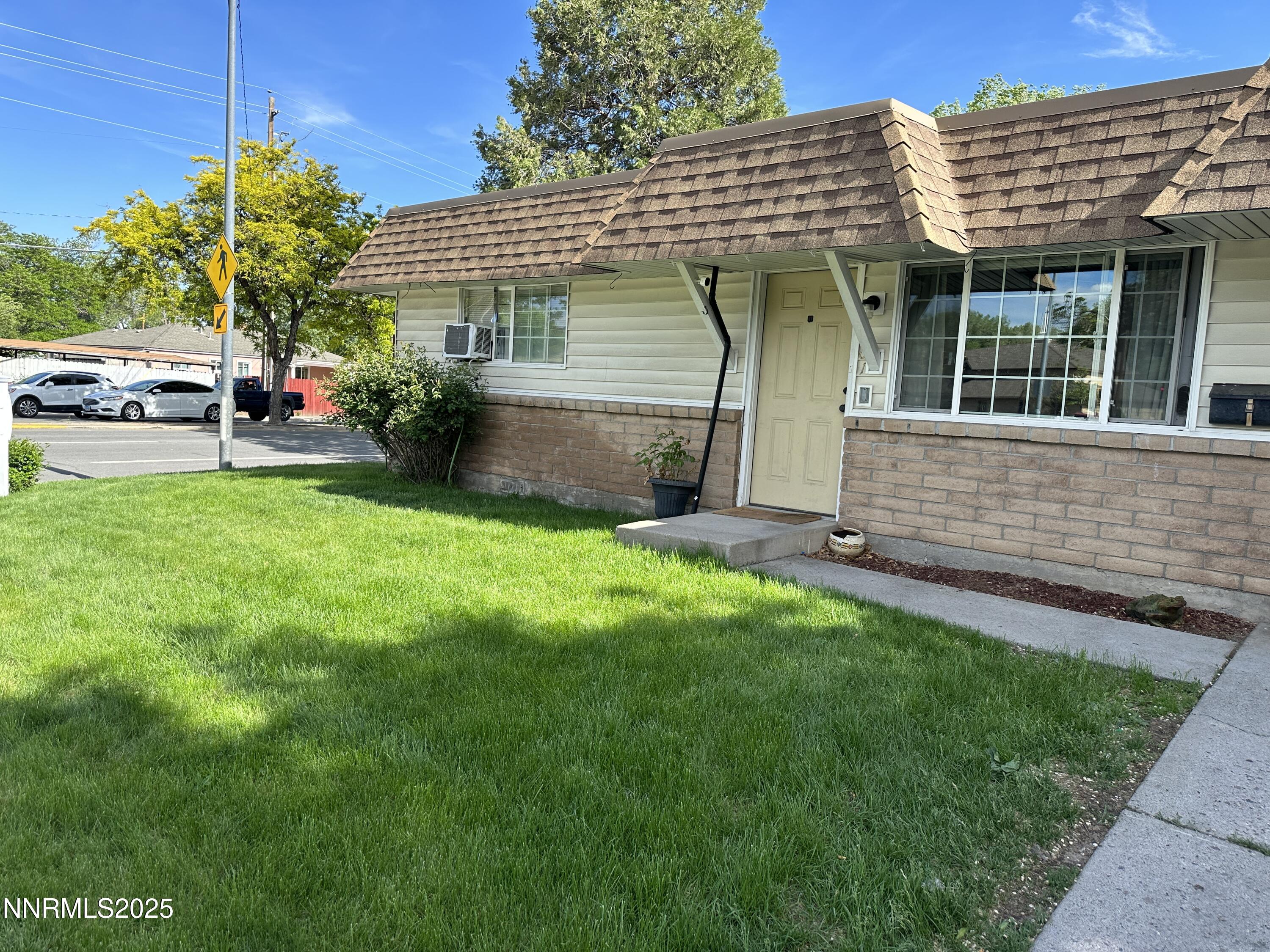 1501 Gault Way Sparks, NV 89431 - Photo 1 of 18 a view of a house with a garden