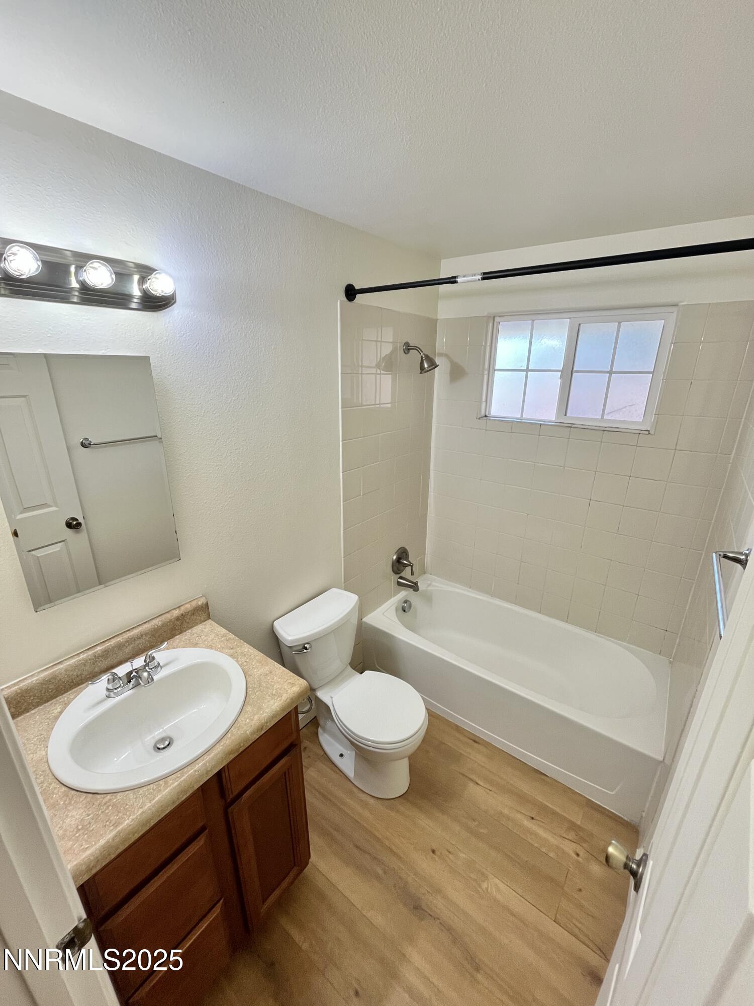 1501 Gault Way Sparks, NV 89431 - Photo 14 of 18 a bathroom with a sink toilet and shower