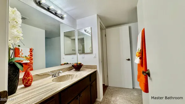 a view of a porch with furniture and a yard