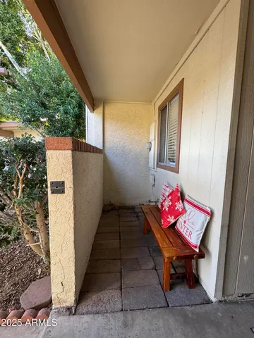 a view of room with window and hardwood