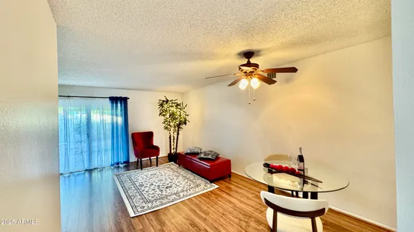 a living room with furniture and a table