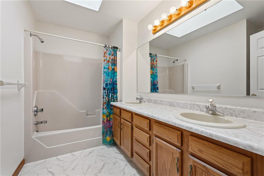 114 Sika Drive Pittsburgh, PA 15239 - Photo 33 of 45 a bathroom with a granite countertop sink mirror toilet and bathtub
