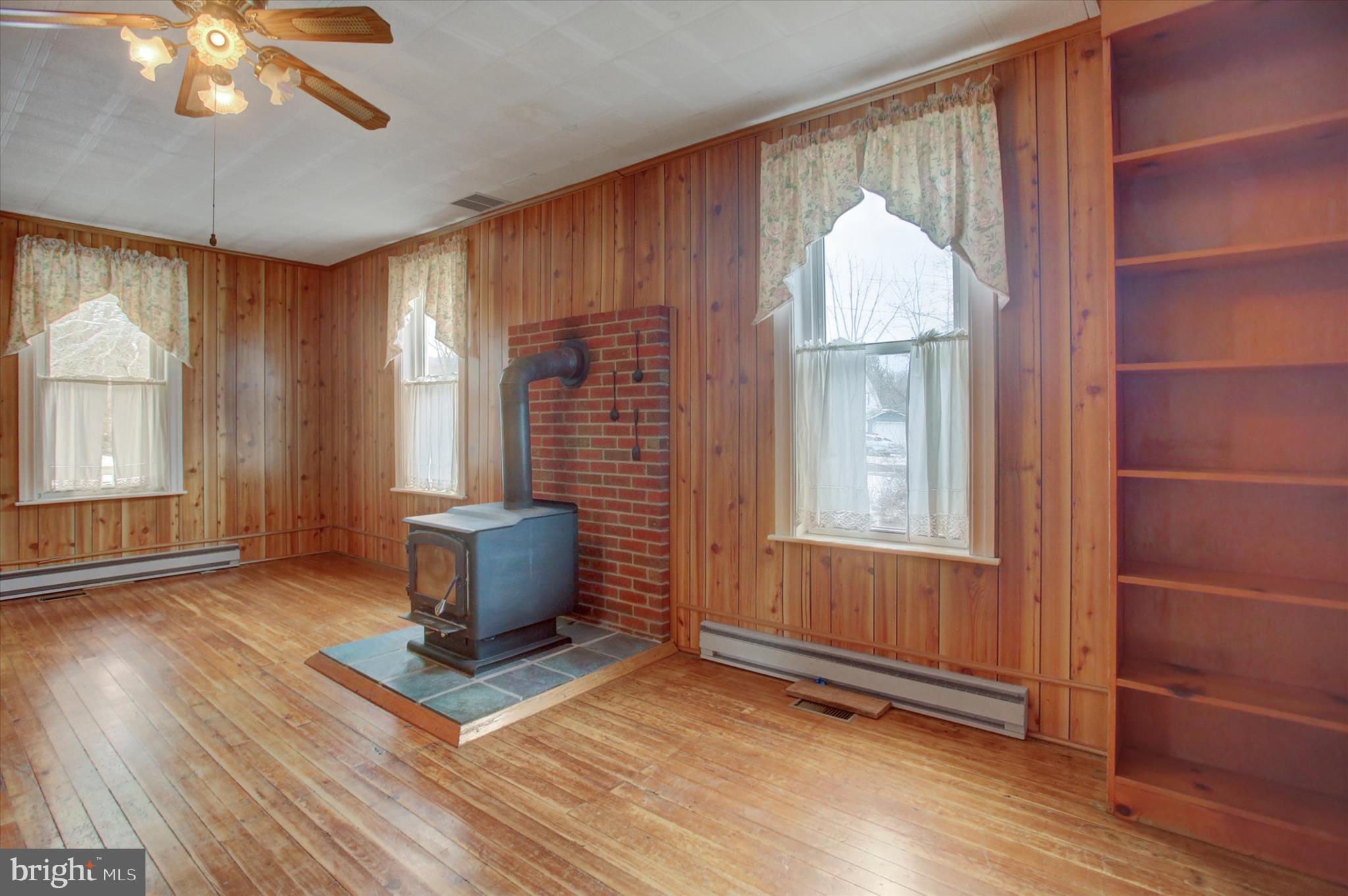13515 Waterloo Road Waynesboro, PA 17268 - Photo 11 of 42 an empty room with wooden floor and windows