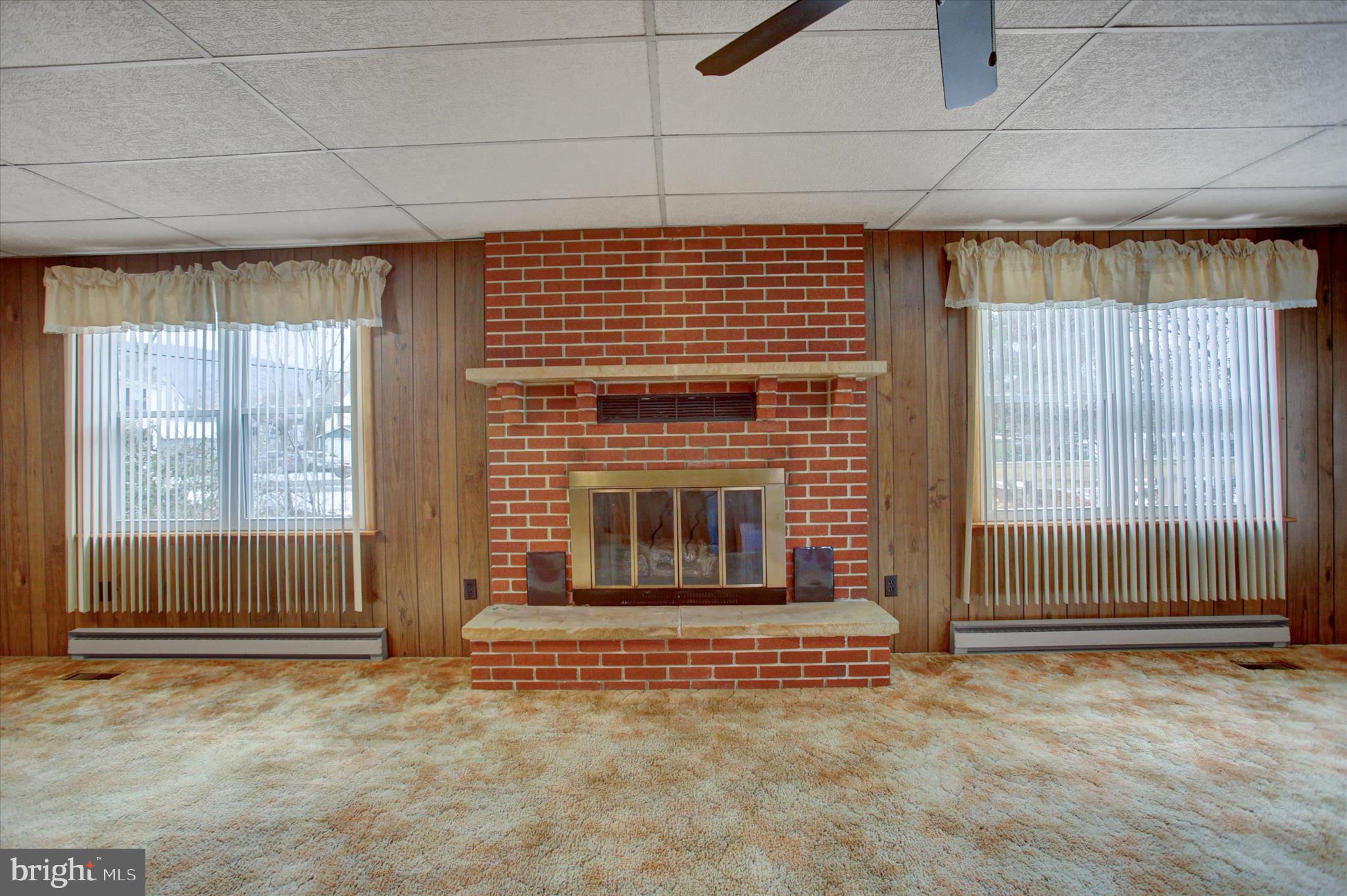 13515 Waterloo Road Waynesboro, PA 17268 - Photo 14 of 42 a view of an empty room with a fireplace and a window