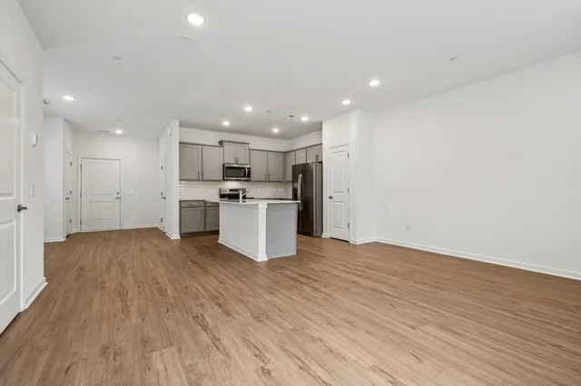 a view of kitchen with wooden floor