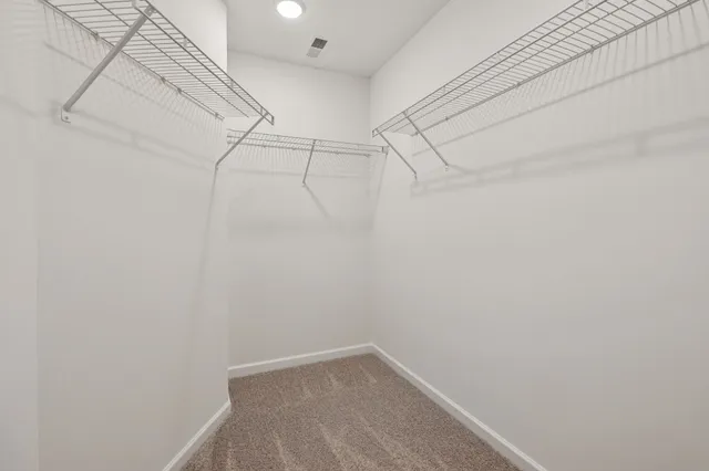 a view of a room with racks on the wall