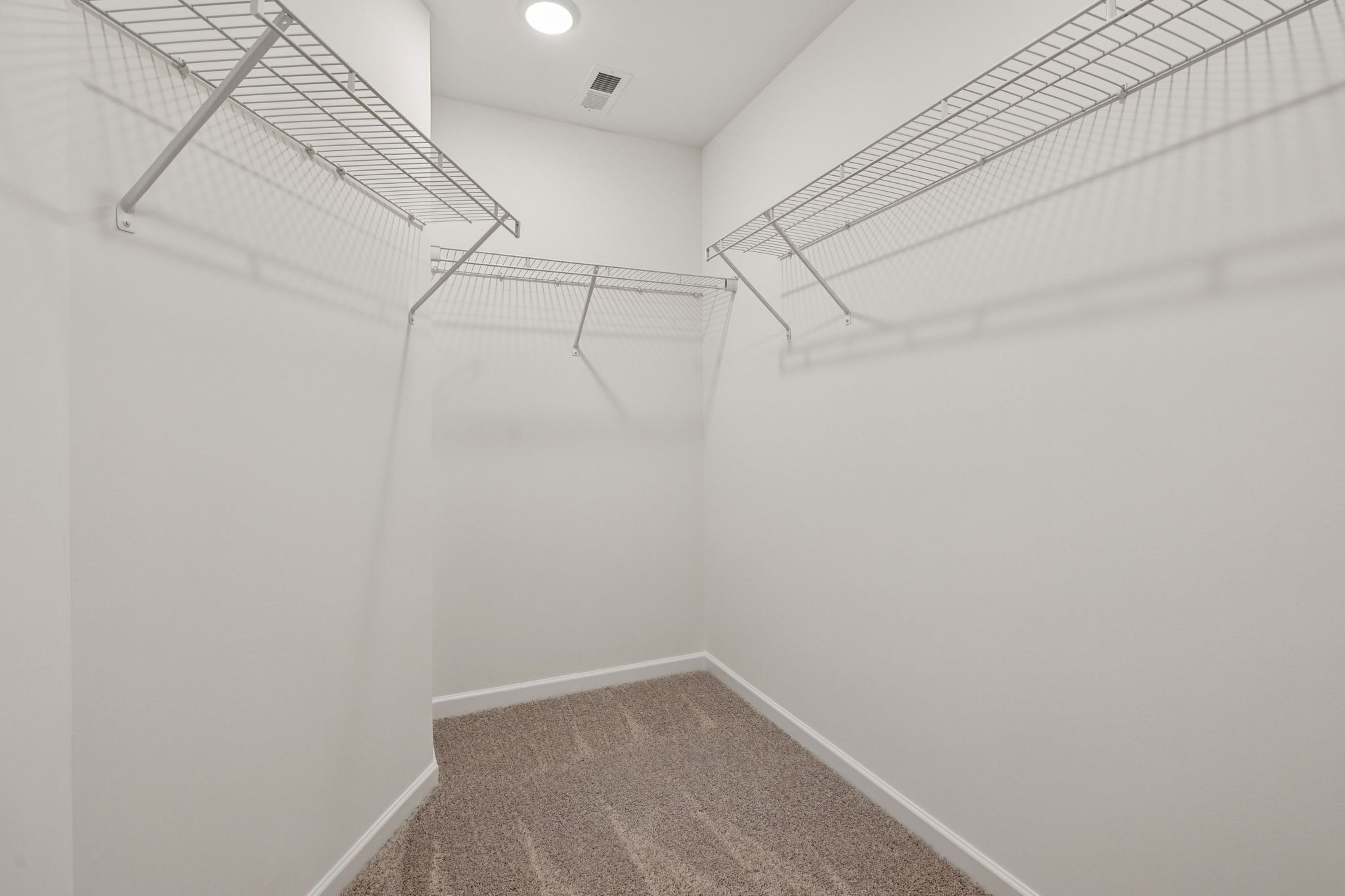 7148 Mapleside Lane Fairview, TN 37062 - Photo 26 of 39 a view of a room with racks on the wall