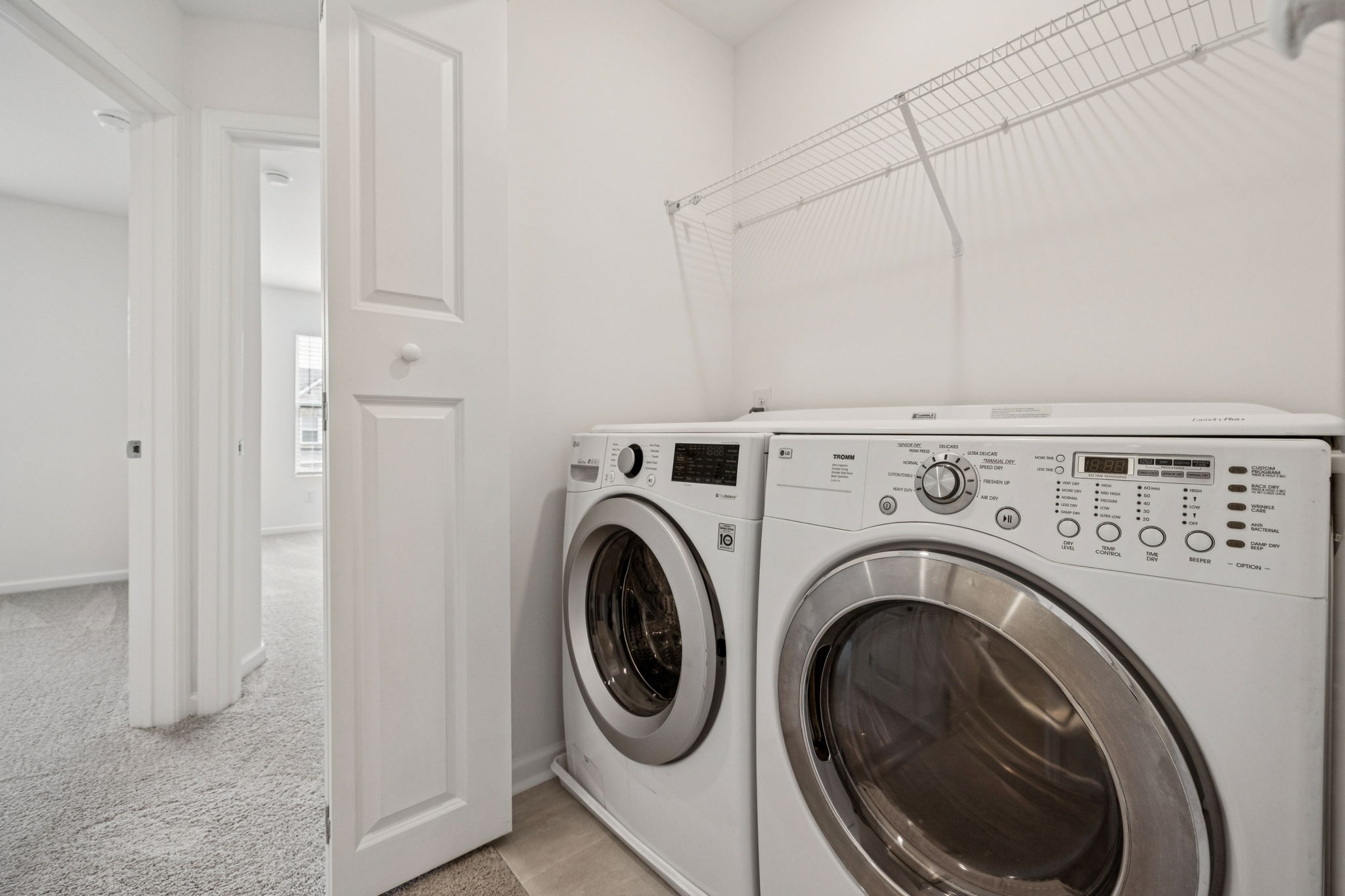 7148 Mapleside Lane Fairview, TN 37062 - Photo 27 of 39 a utility room with dryer and washer