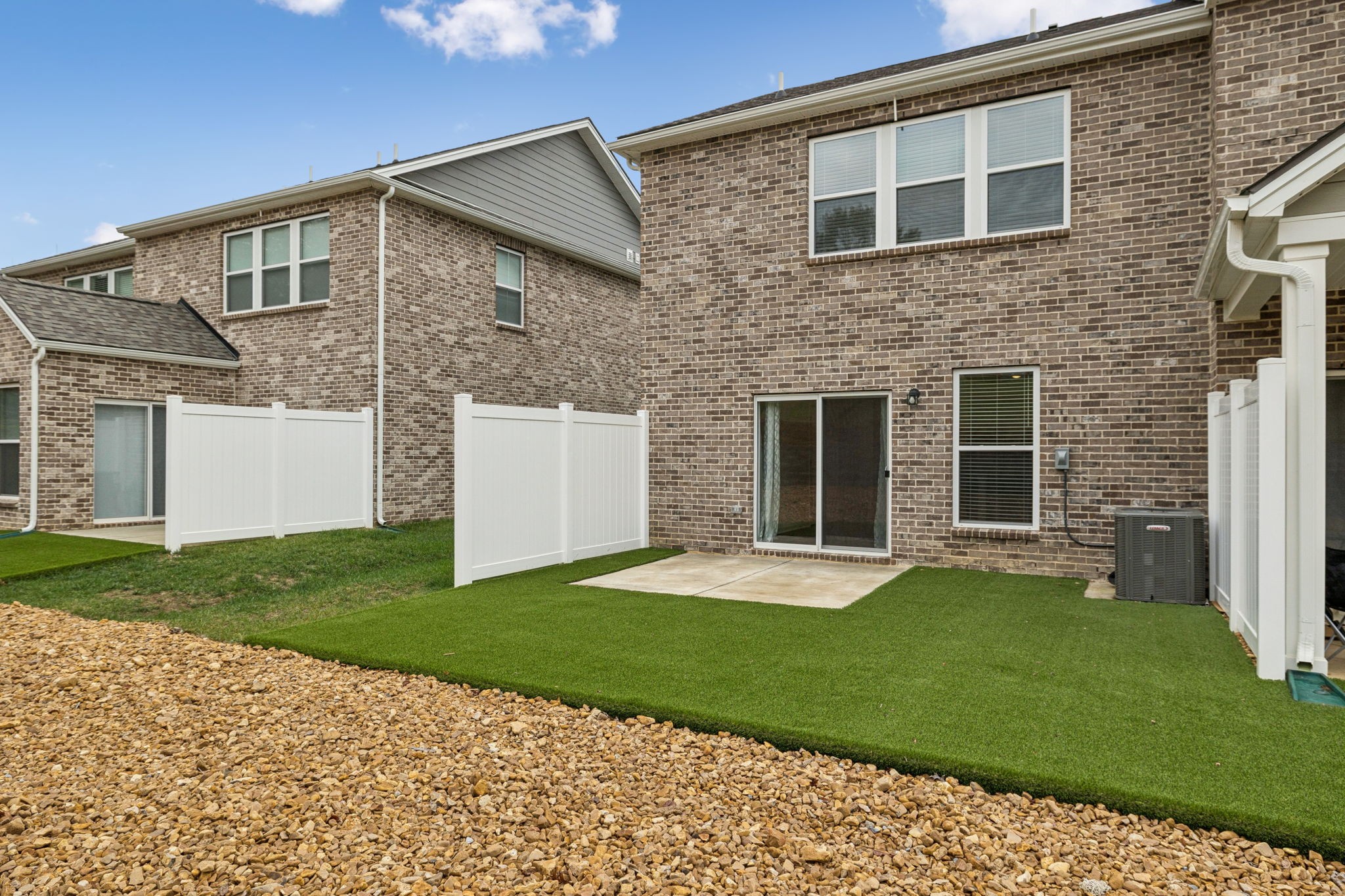 7148 Mapleside Lane Fairview, TN 37062 - Photo 35 of 39 a front view of a house with a yard and garage