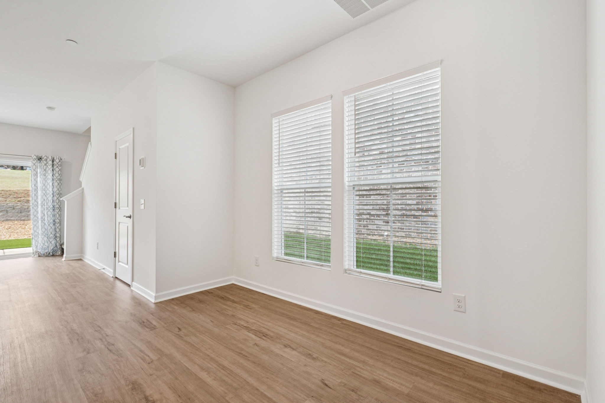 7148 Mapleside Lane Fairview, TN 37062 - Photo 5 of 39 a view of a livingroom with wooden floor