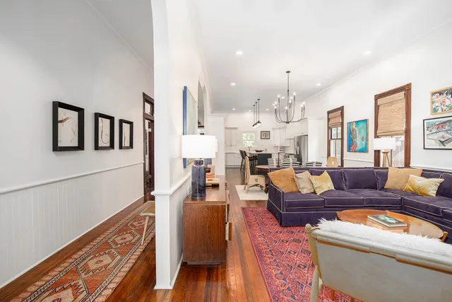 a kitchen with cabinets stainless steel appliances and a window