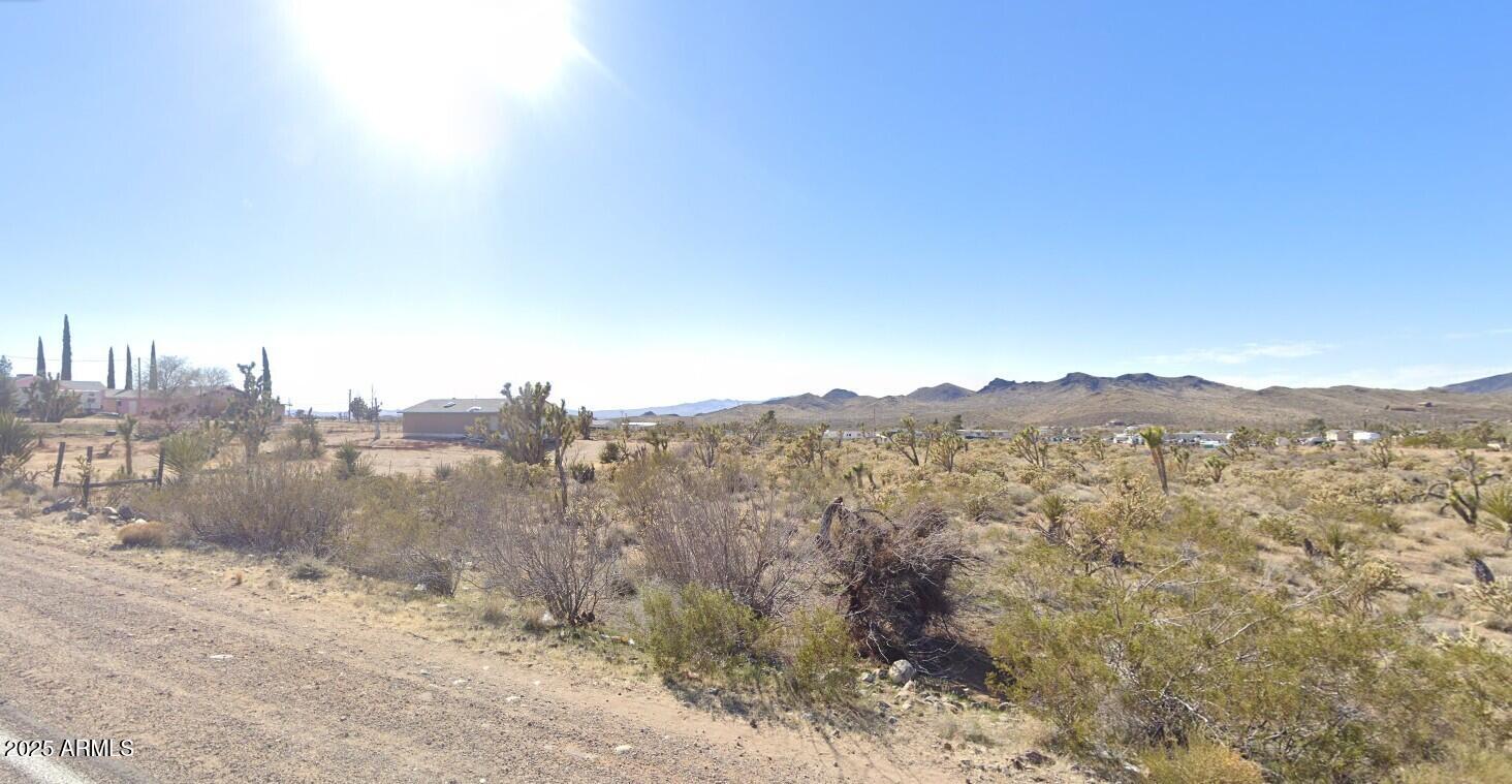 16773 Pierce Ferry Road, Unit 116 Dolan Springs, AZ 86441 - Photo 5 of 6 a view of a town with mountains in the background