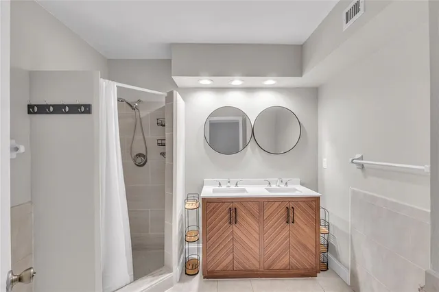 a front view of a bathroom with utility and utility room