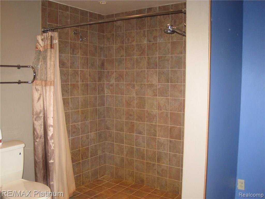 10264 Byron Road Howell, MI 48855 - Photo 12 of 16 Handicap accessible bathroom