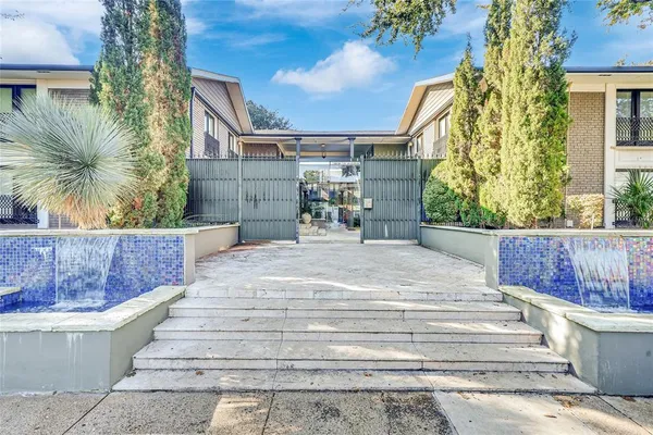 a swimming pool with outdoor seating and yard
