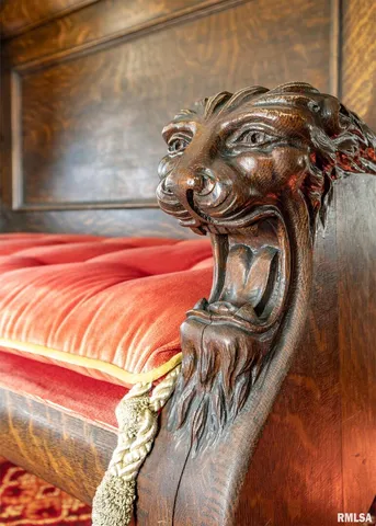 a bedroom with a bed and a fireplace