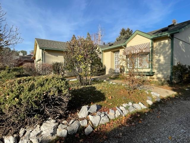 166 Oak Tree Circle Murphys, CA 95247 - Photo 20 of 21 a view of a house with a yard