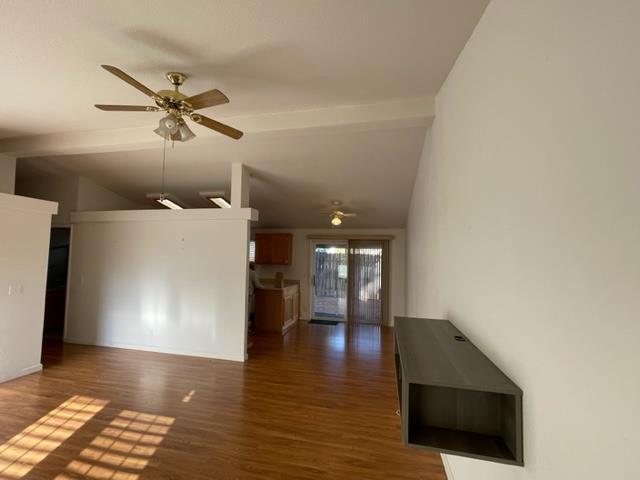166 Oak Tree Circle Murphys, CA 95247 - Photo 4 of 21 a view of a livingroom with a ceiling fan and wooden floor