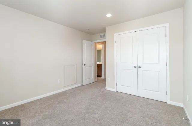 wooden floor and closet in a room