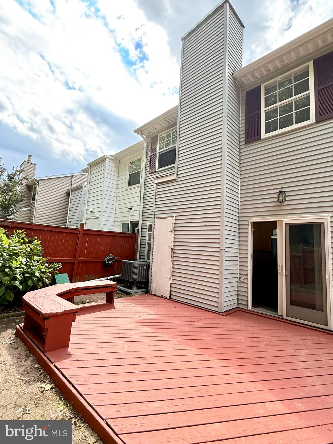 6029 Selwood Place Springfield, VA 22152 - Photo 16 of 16 a backyard of a house with seating space