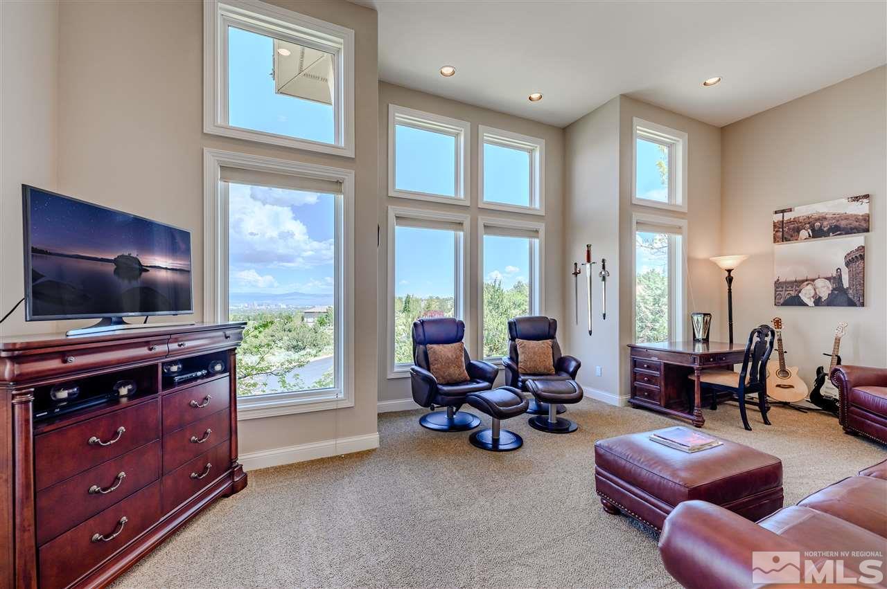 10 Sharps Circle Reno, NV 89519 - Photo 12 of 21 a living room with furniture and a flat screen tv