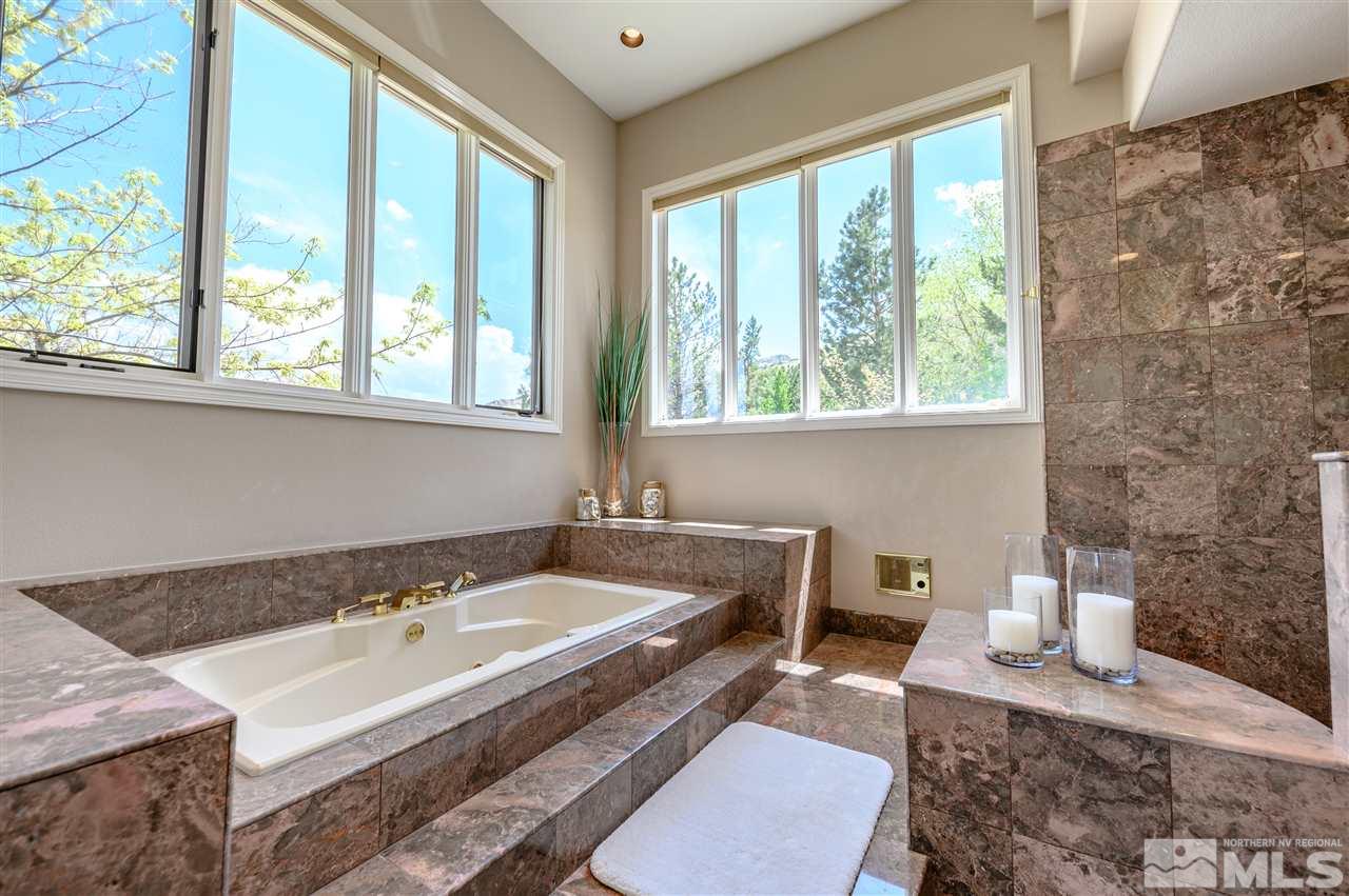 10 Sharps Circle Reno, NV 89519 - Photo 14 of 21 a bath room with a sink and a window