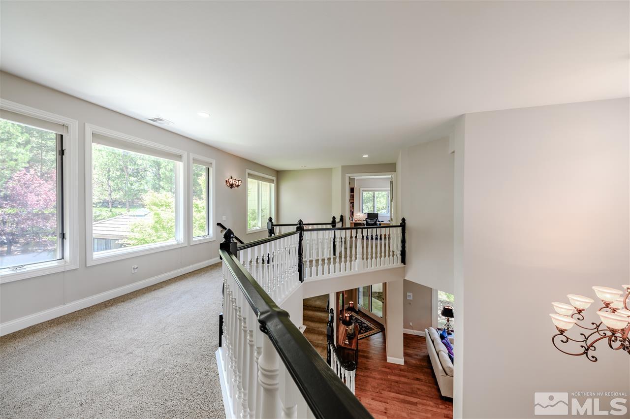 10 Sharps Circle Reno, NV 89519 - Photo 17 of 21 a view of a livingroom with furniture hardwood floor and staircase