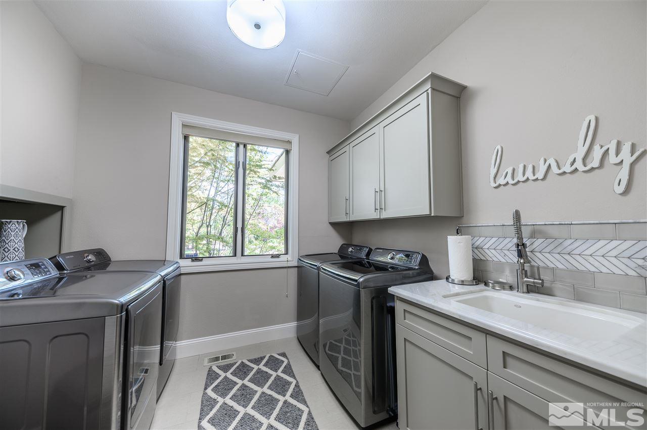 10 Sharps Circle Reno, NV 89519 - Photo 20 of 21 a kitchen with a sink stove and cabinets