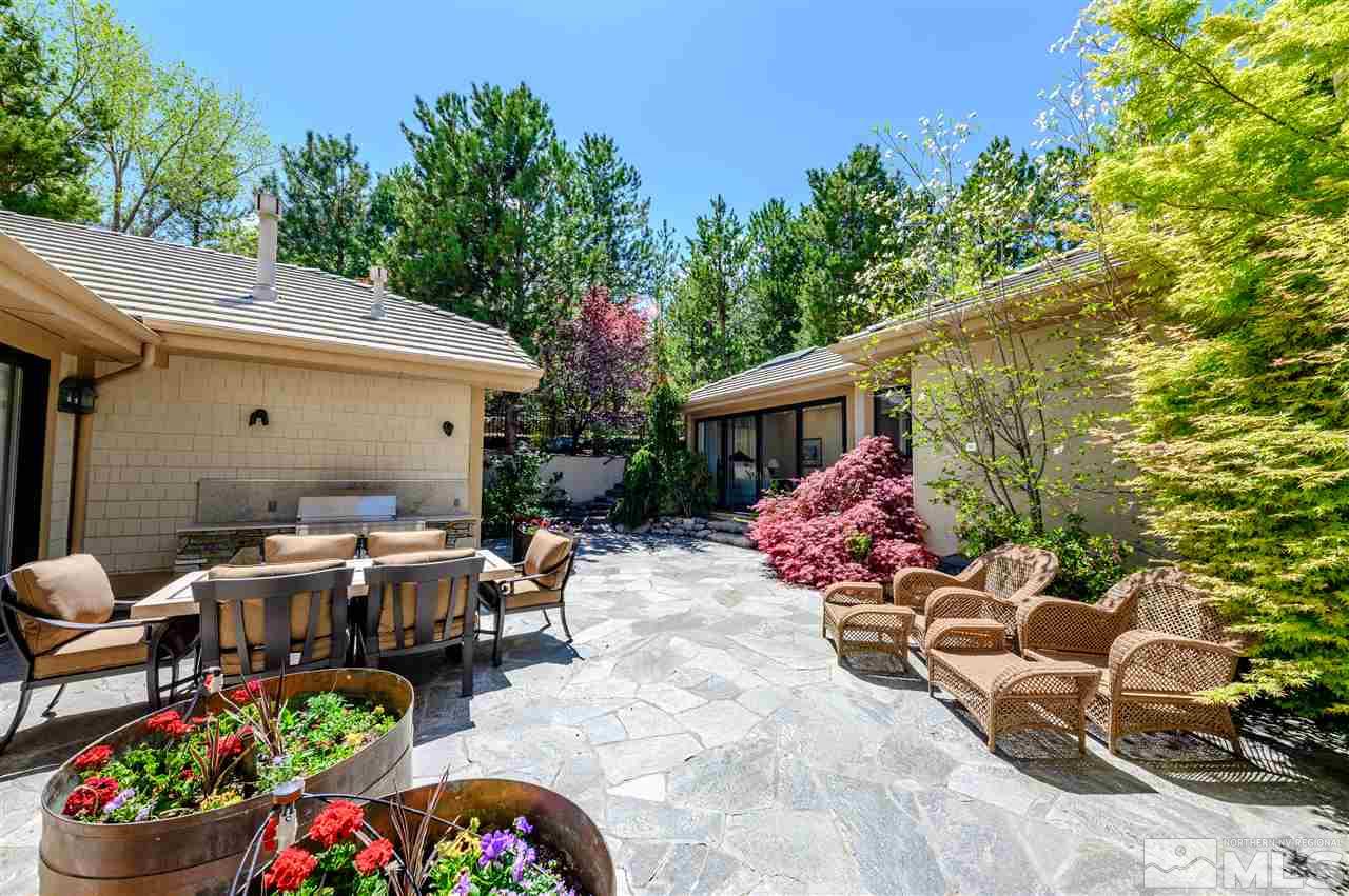 10 Sharps Circle Reno, NV 89519 - Photo 4 of 21 a view of a patio with furniture and a table and chairs