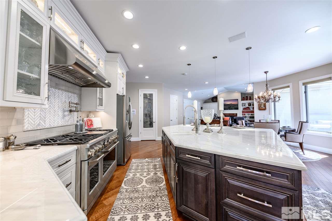 10 Sharps Circle Reno, NV 89519 - Photo 8 of 21 a kitchen with stainless steel appliances granite countertop a stove and a sink