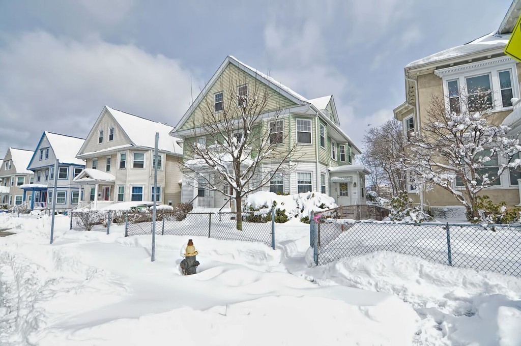 40-42 Mapleton Street Boston, MA 02135 - Photo 2 of 17 a view of a building with a bench