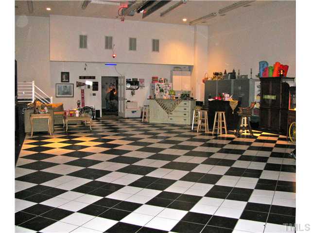 6029 Farmpond Road Apex, NC 27523 - Photo 8 of 8 Huge duel firetruck size garage. Fully conditioned space for grand events or modify for your commericial needs.