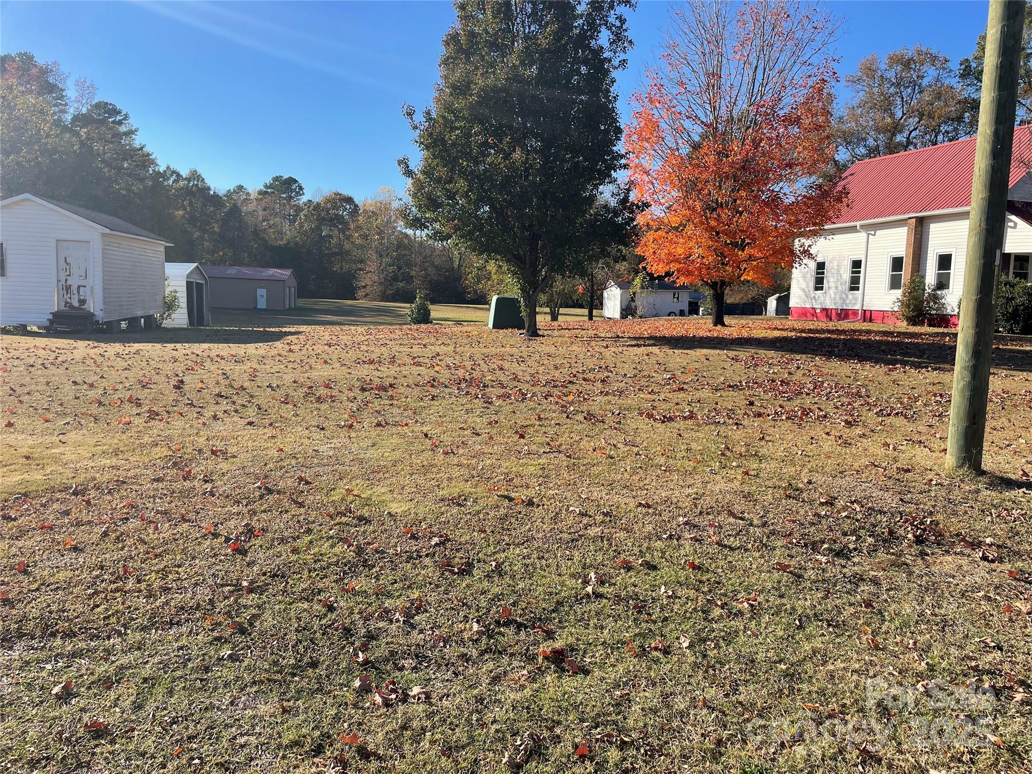 2865 Lentz Road China Grove, NC 28023 - Photo 1 of 16 a view of road and trees