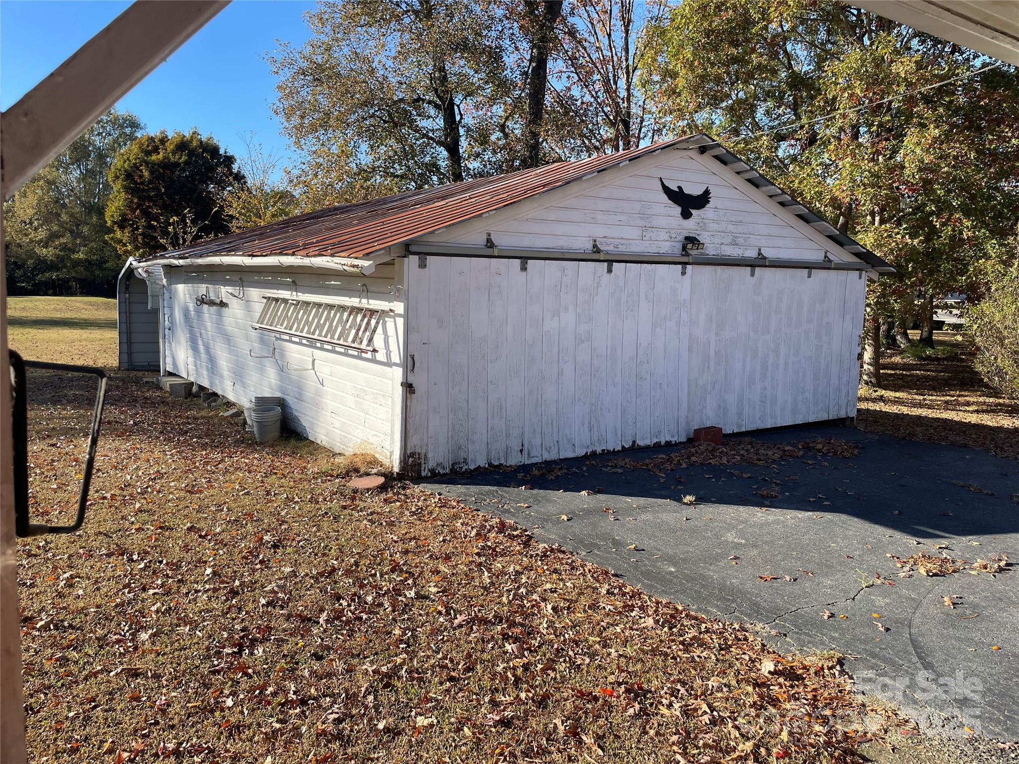 2865 Lentz Road China Grove, NC 28023 - Photo 16 of 16 a view of a small house with a yard