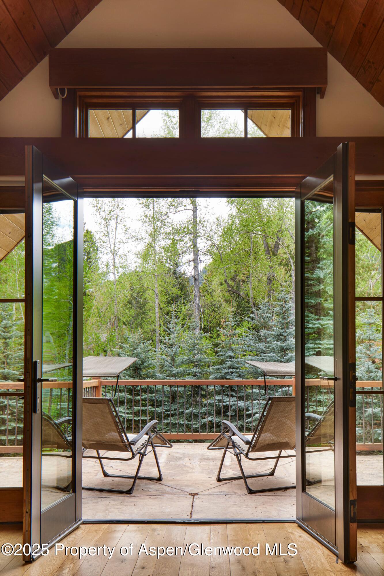 143 Conundrum Creek Road Aspen, CO 81611 - Photo 18 of 19 a view of a room with a large window