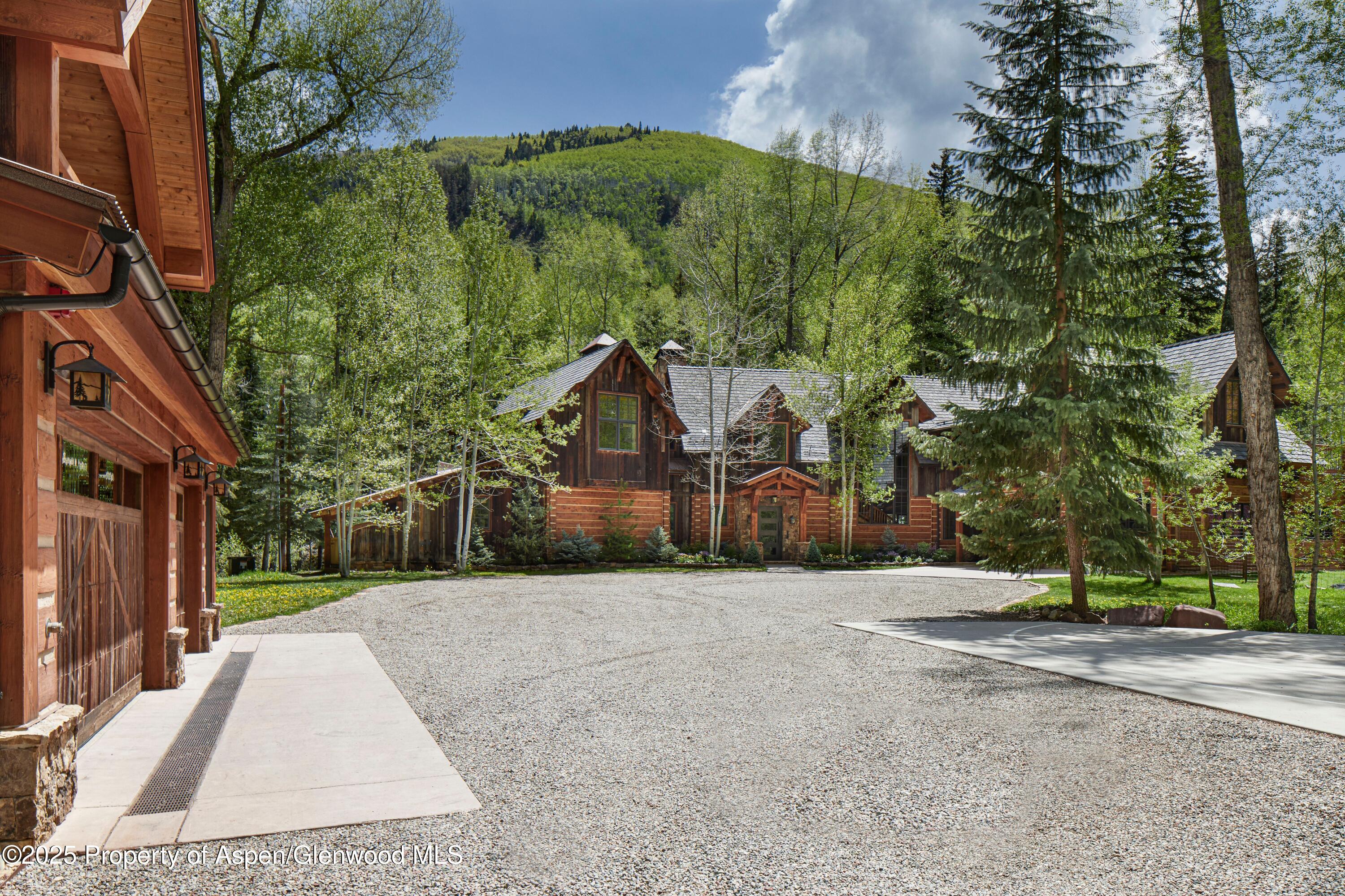 143 Conundrum Creek Road Aspen, CO 81611 - Photo 6 of 19 a view of a house with a park