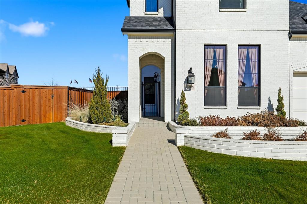 16194 Inca Dove Court Frisco, TX 75035 - Photo 2 of 40 Unique courtyard entrance to property.